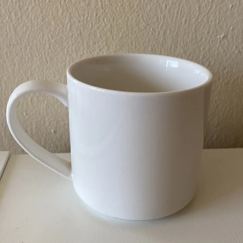Starbucks 2014 White Embossed Coffee Cup Mug 12oz